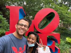 Javion with his cousin at the LOVE statue