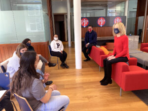 Dr. Gutmann speaks with students in the Penn Shleifer Family First Plus Center lobby